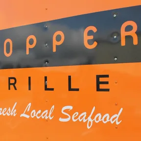Copper Grille logo